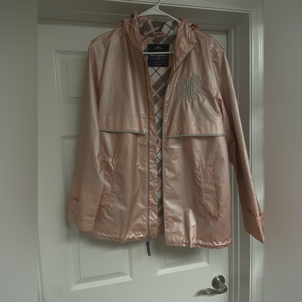 Women’s light pink rain jacket. Monogrammed with silver initials CMA